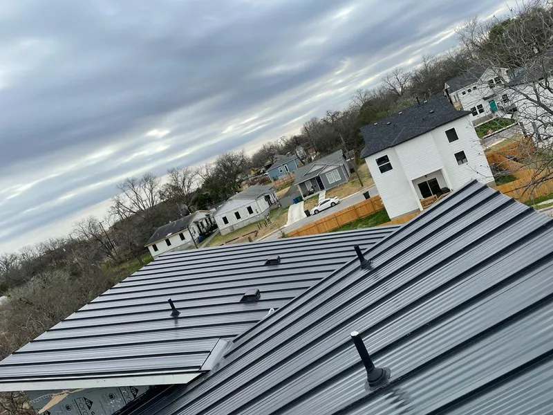 Standing seam metal roof panels with vents for Skylight Repair in Kimball